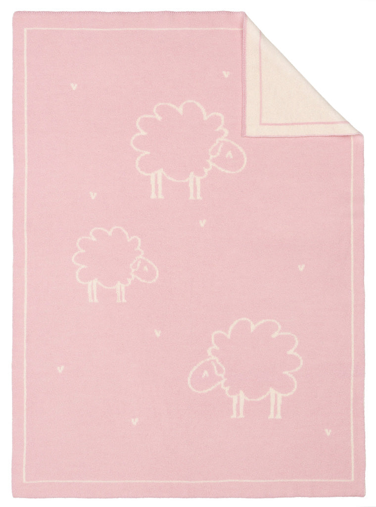 Babydecke Lilly von Eagle Products aus 100 % Merino Schurwolle in der Farbe Puder mit weißen Schafen