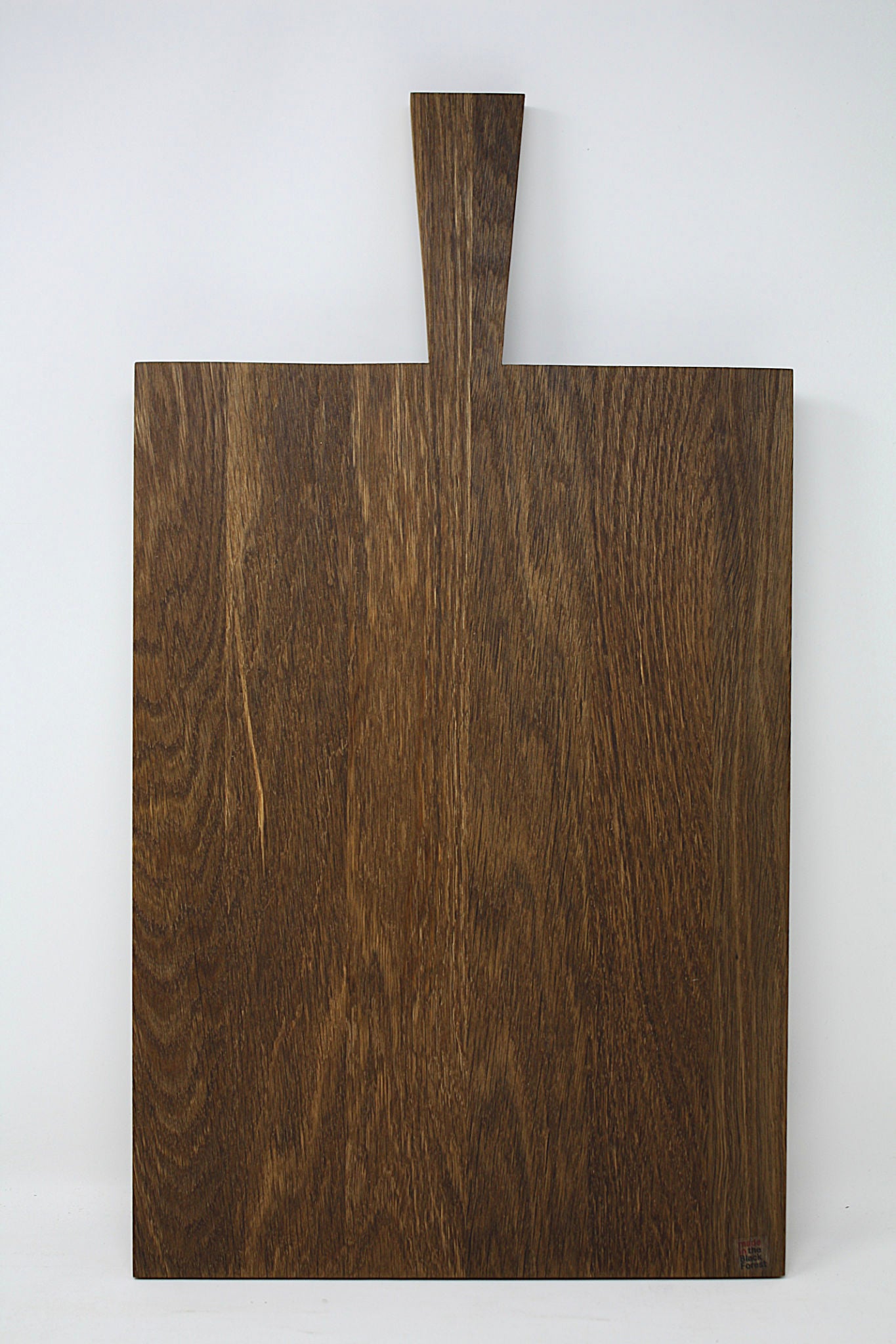 Brett mit Griff aus massiver Eiche dunkel geölt – Raumgestalt Schneidebrett