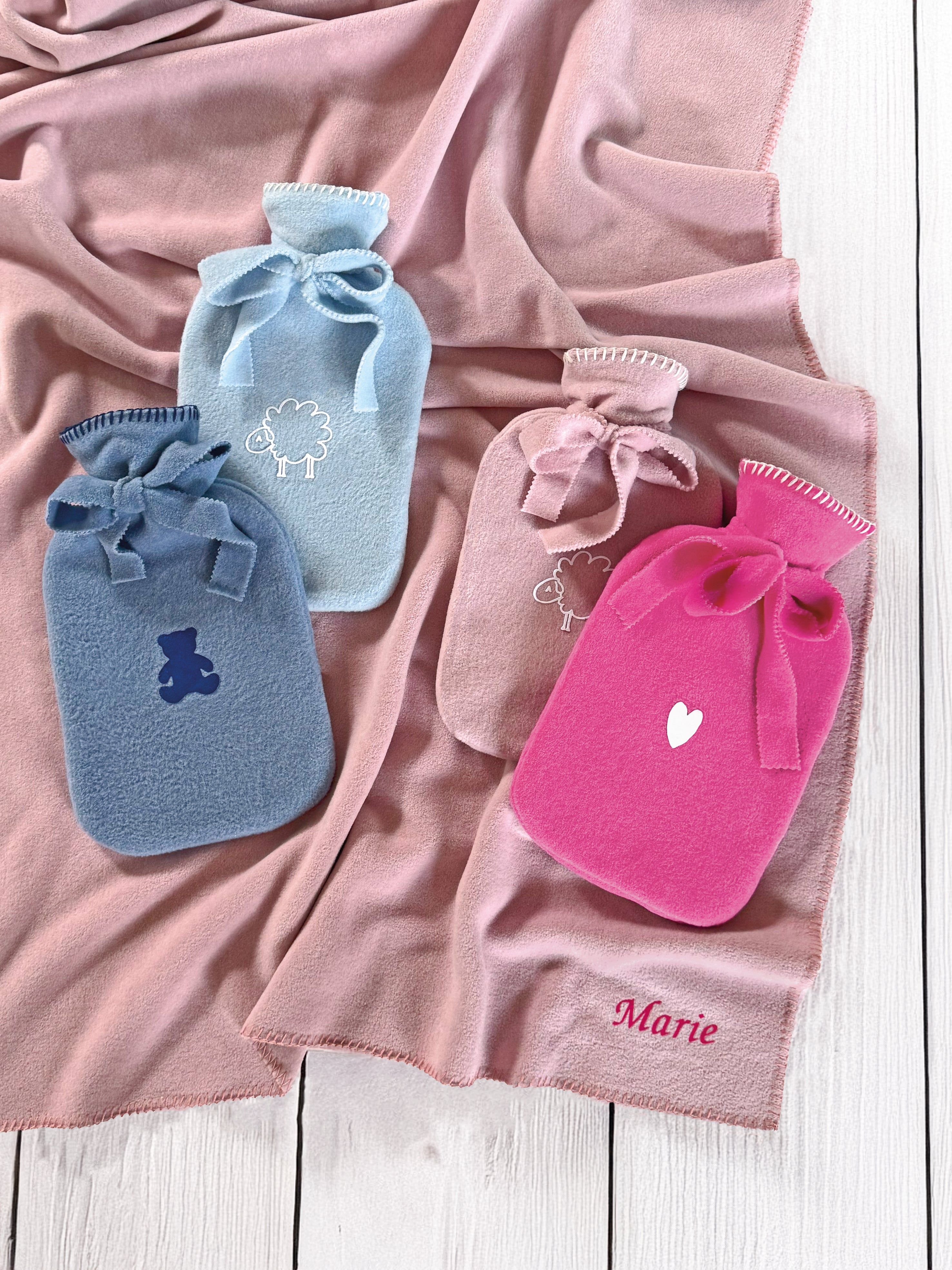 Wärmflaschen Olaf & Elsa von Eagle Products aus kuscheligem Fleece mit verschiedenen Motiven wie Teddy, Schaf und Herz